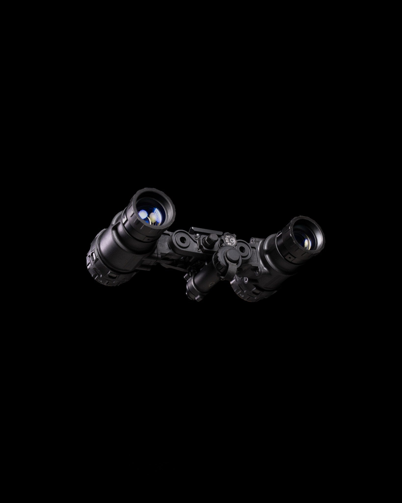 UH-1 USA-made dual-tube binocular night vision goggle on black background